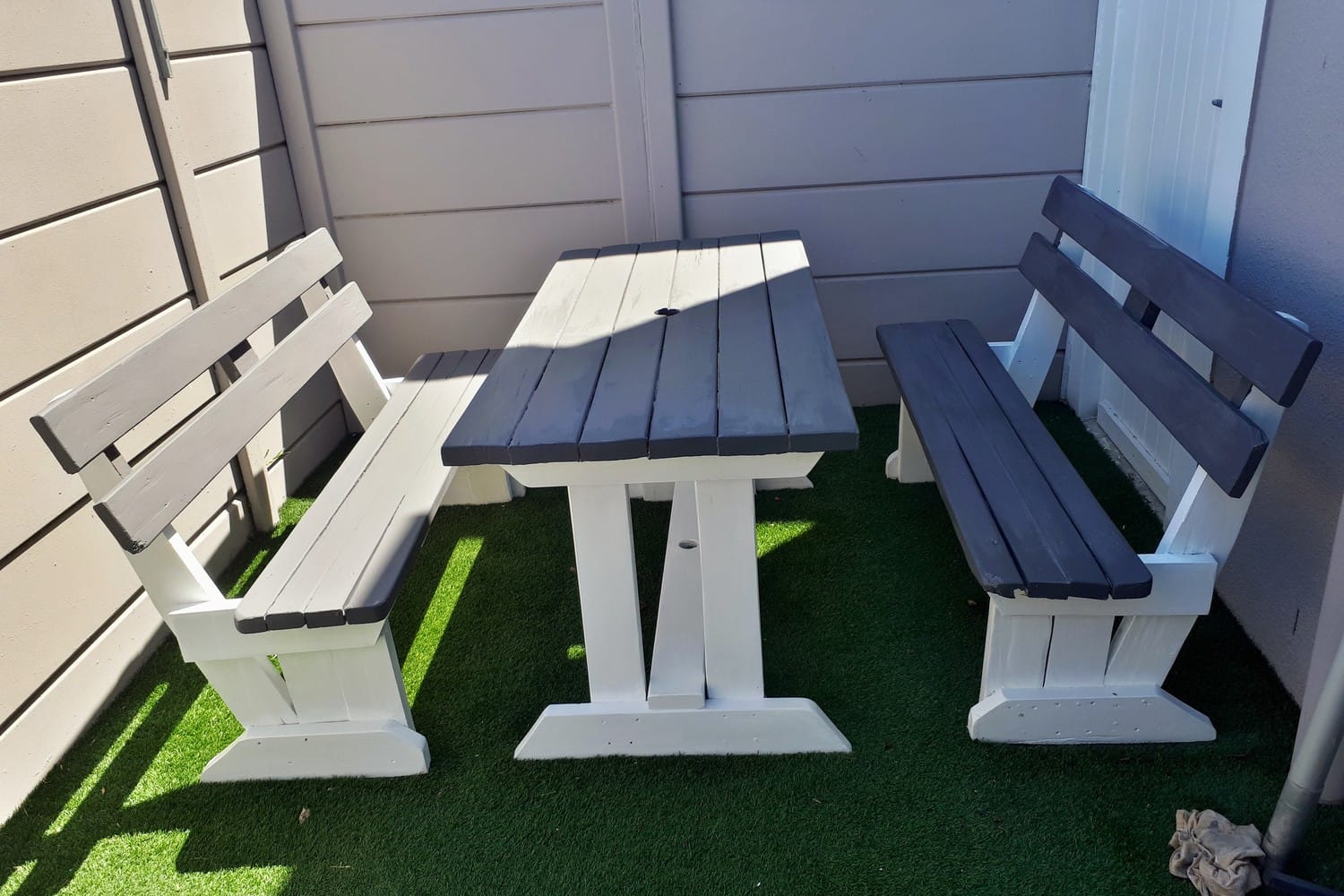 The same Somerset West set painted in white frames with dark grey slats