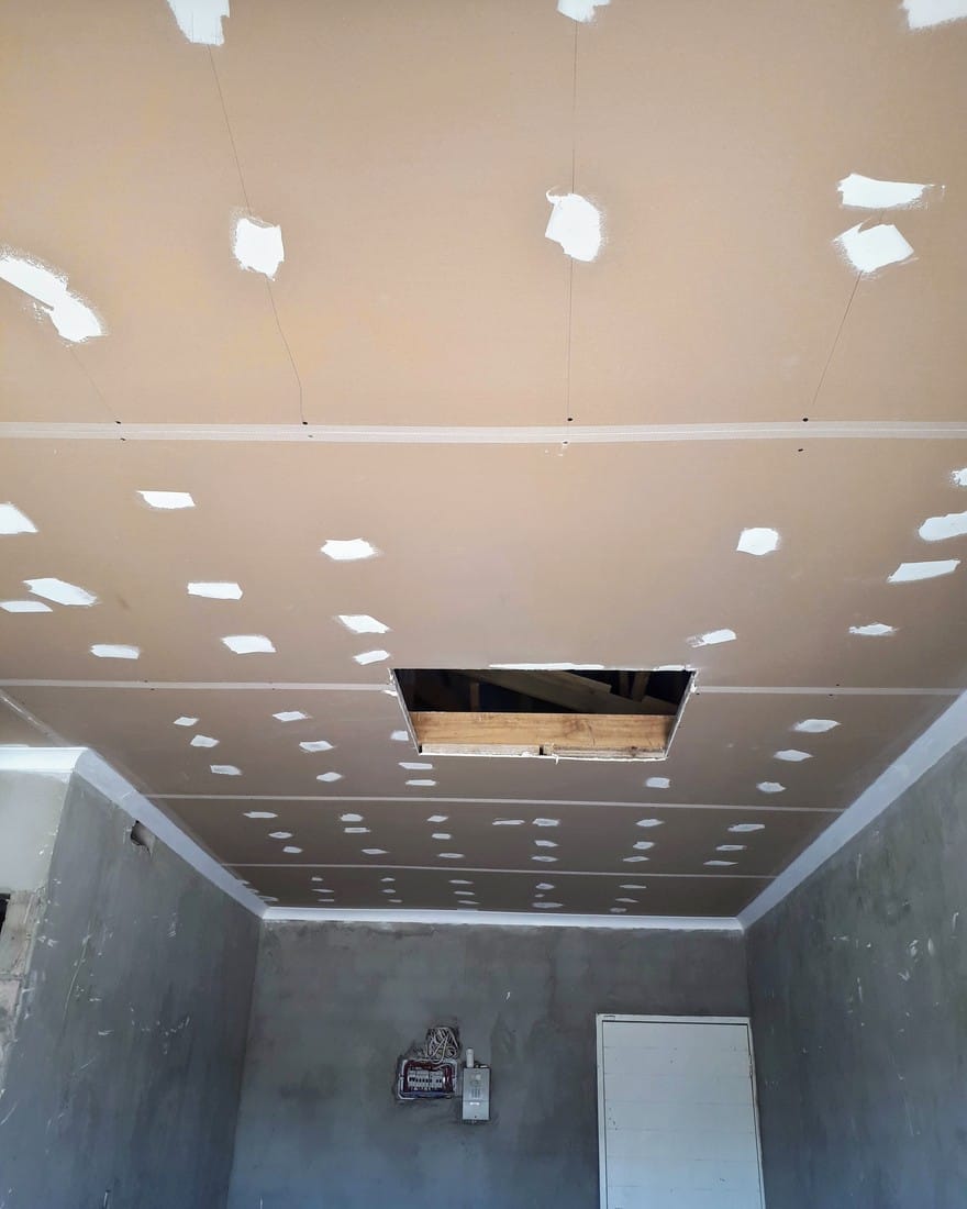 Ceiling mid preparation, filler dots ready for sanding before painting
